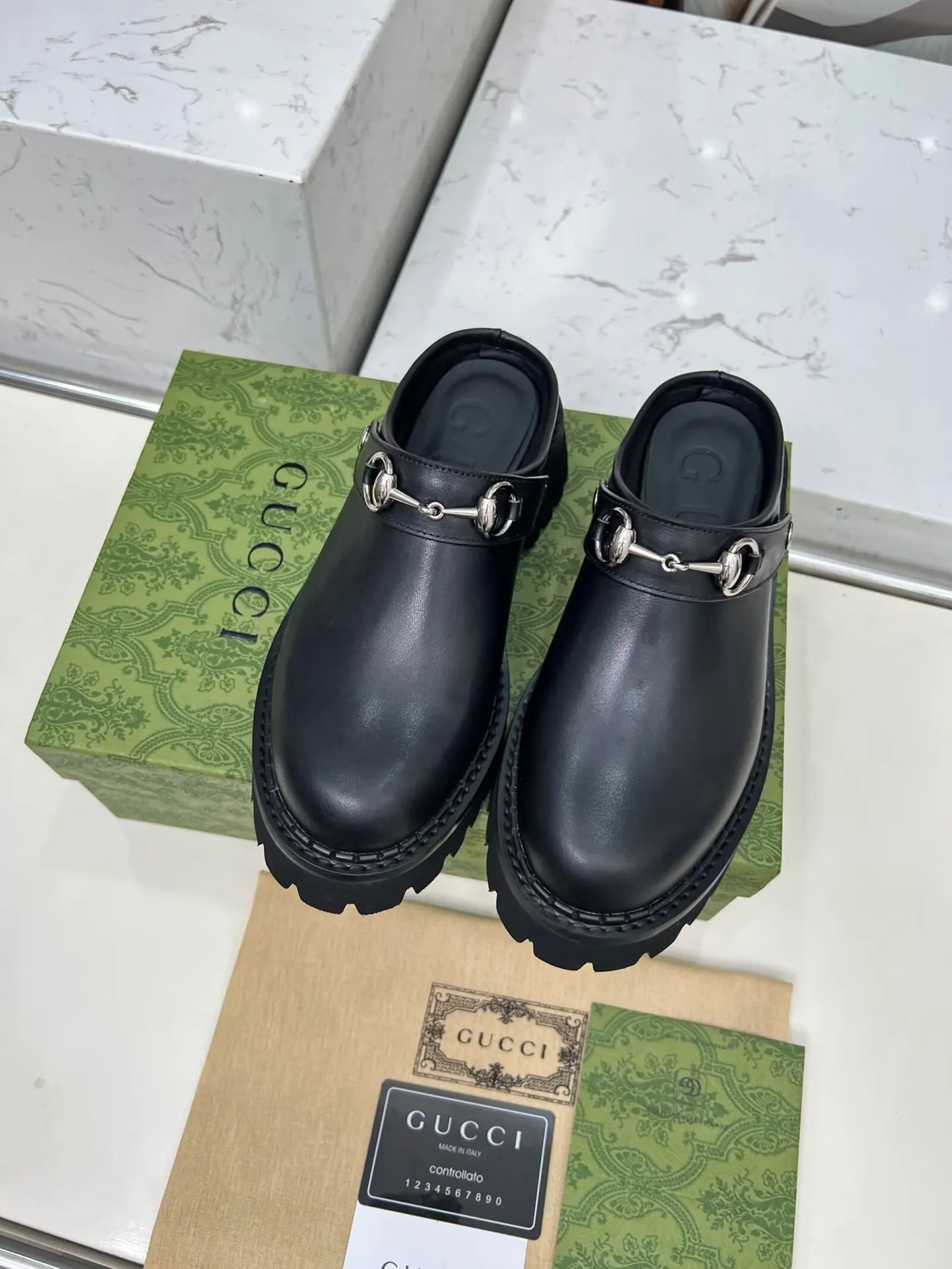 👟👟Ex-factory price 480👟👟 GUCCI British-style fashion slippers, lazy design back stumbling ➕thick sole increased height, empty back shape looming with exposed ankles, super cool when walking, age-neutral style, wide audience, Fabric: cowhide, mercerized cow suede Lining/foot pad: cowhide Outsole: foam outsole Heel height: 5cm Number of yards: 35-42 (customized numbers at both ends) Color: 4 colors available: black, brown, and military green Packing: card, bag